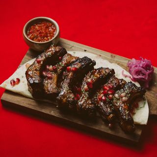 Coaste de Porc cu Sos Tkemali