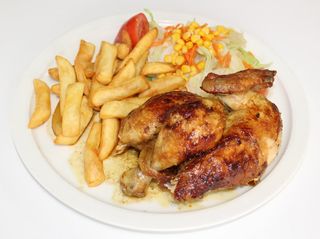 1/2 Pollo asado con dos guarniciones
