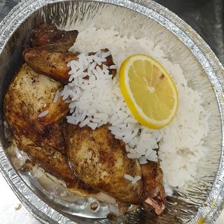 Medio Pollo A L'Ast Con Arroz