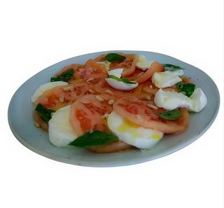 Ensalada De Tomate, mozzarella, albahaca y piñones