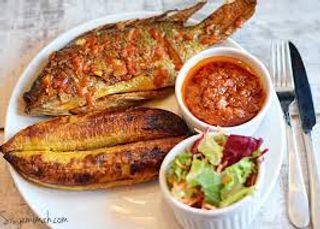 Tilapia fish, plantain, yam and salad