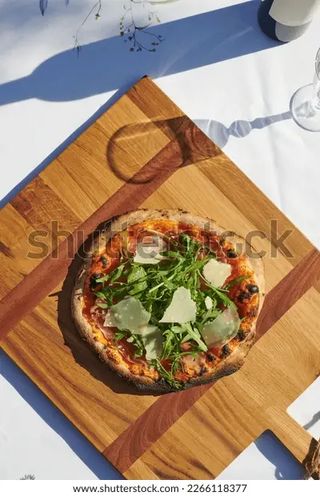 Pizza stracchino e rucola