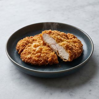 Cotoletta di pollo con patatine