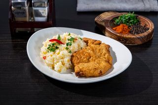 Snitel de porc  cu orez