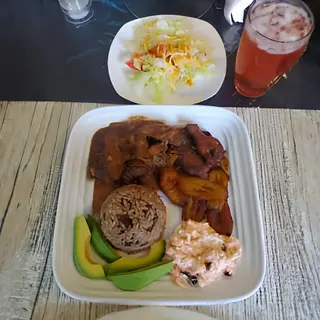 BBQ turkey with French fries, plantain & coleslaw