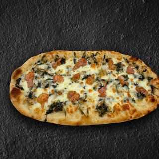 Cicoria ripassata e salsiccia di maialino nero casertano