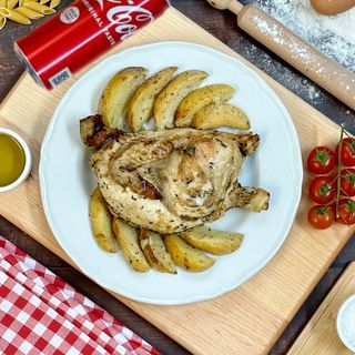 Menù mezzo pollo con patate al forno