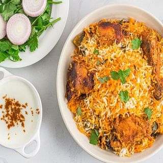 Chicken Biryani with Raita and Salad with Coca-Cola Original 350ml PET