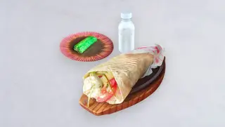 Tortilla wrap mutabbal bakłażan, baklawa pistacjowa, ayran