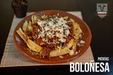Patatas A La Boloñesa