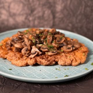 Kotlet słoneczny z pieczarkami