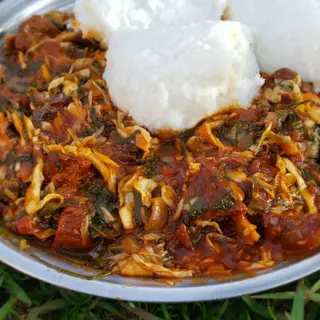 1 kg fried pork with avocado, cabbage & posho