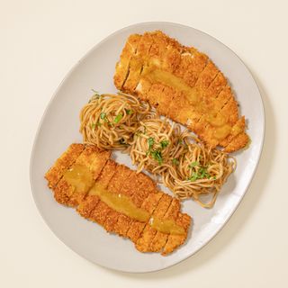 Escalope de poulet au curry et coco