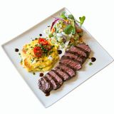 Filetes De Lomo, Tortilla Española Y Ensaladilla Rusa