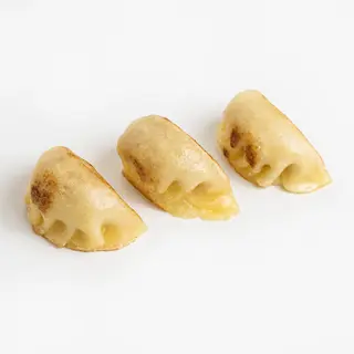 1A. Ravioli di carne alla piastra 4 pezzi