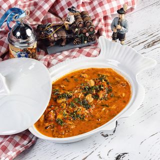 მიდიების  ხორცი ცოცხალ პომიდორში (3 პერსონაზე)