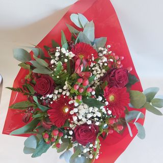 Bouquet misto tonalità rosso 