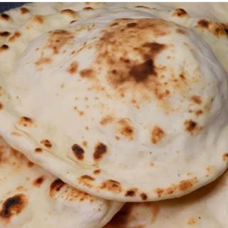 11 Naan roti grande 1 pezzo 