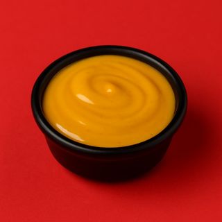 - Salsa: Queso Cheddar -