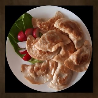 Pierogi z mięsem i kapustą