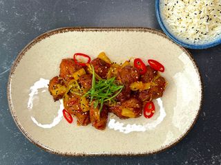 Курка в кисло-солодкому соусі з паровим рисом (280+120g)