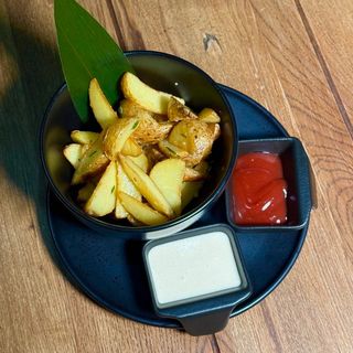 Картопляні скибочки з часником та розмарином (220г)