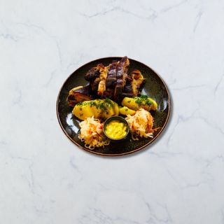 რაჭული ლორი მოხარშული კარტოფილით 