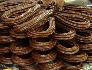 Churro bañado en chocolate fundido (1 Ud.)