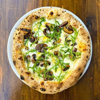 Pizza gorgonzola y champiñones