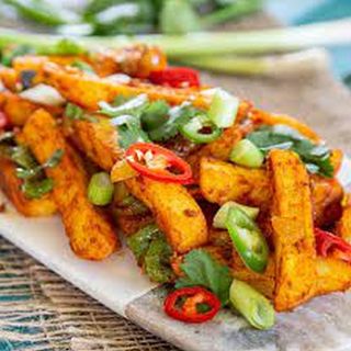 Chips Masala Served with Salad