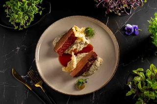 Piept de rata cu piure de telina cu trufe