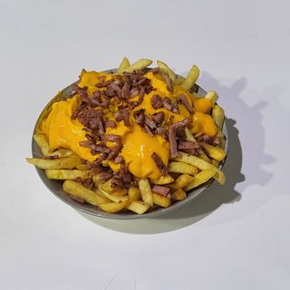 Patatas con cheddar y baicon