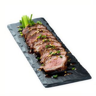 Pato Sobre Bandeja Quemada