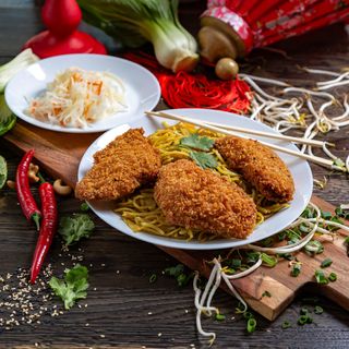 69. Filet z ryby w ostrym sosie soj. z warzywami