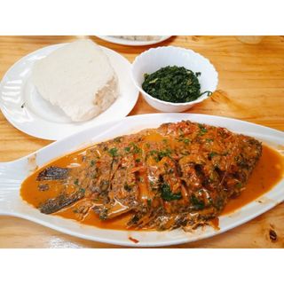 Fish stew + veg served with ugali