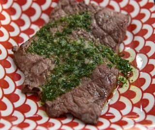 Tagliata di manzo con rucola e pomodorini