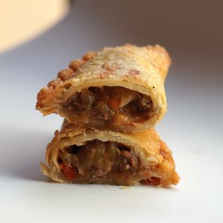 Empanada De Asado Y Provolone