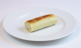 Млинці з сиром та родзинками