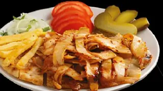 Chicken shawarma on a plate.tavuk servis..
