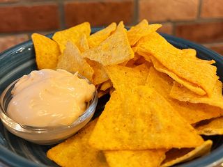 Начос з соусом Чилі