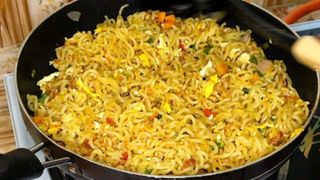 Indomie Table Eggs And Corned Beef