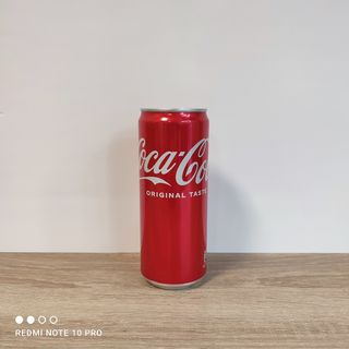 Coca-Cola lattina 33 l 