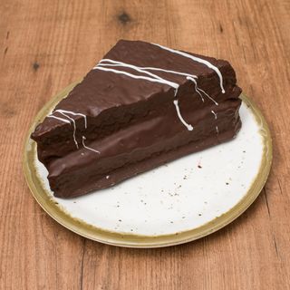 Triangulo de chocolate relleno de crema