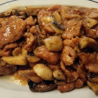 Ternera con champiñones