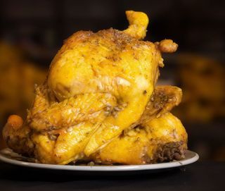 Pollo allo spiedo con patate al forno