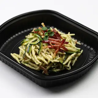 Pasta con speck e zucchine