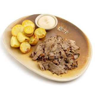 Pierna de cordero a l'ast