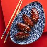 Крильця в соусі теріякі