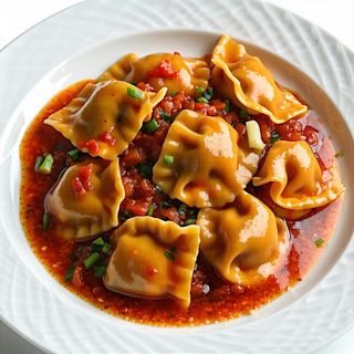 Plin  raviolini al sugo di brasato