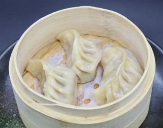 213. Gyoza ravioli di carne a vapore